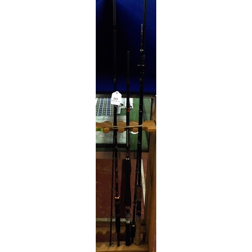 315 - Two spinning fishing rods together with a fishing rod butt section