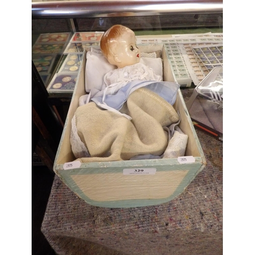 329 - A vintage child's Roddy doll together with a hand made wooden crib