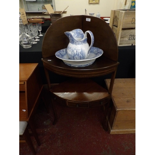 332 - A Georgian mahogany corner wash stand together with a blue and white ceramic chamber jug and bowl