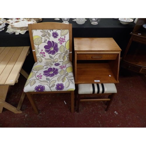 333 - A mid century telephone seat together with a chair upholstered in floral design fabric