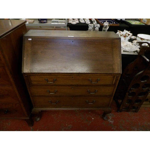 337 - A mahogany fall front bureau the fall concealing a fitted interior