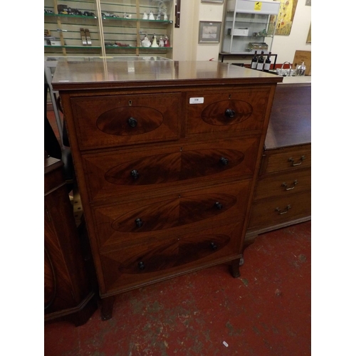 338 - A flamed mahogany chest of two short over three long drawers