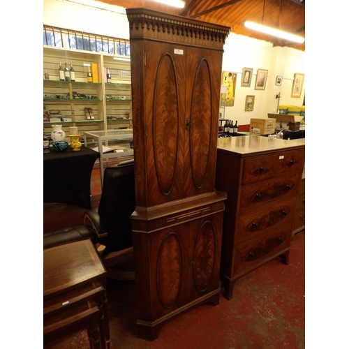 339 - A mahogany corner cabinet