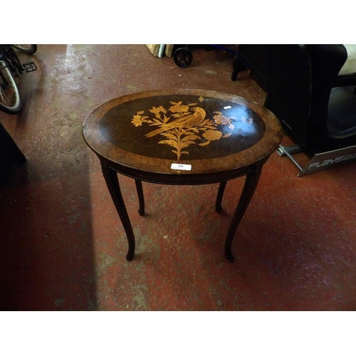 341 - A vintage mahogany oval occasional table with profuse marquetry decoration