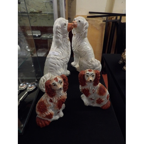 352 - Two pairs of Victorian Staffordshire mantle dogs