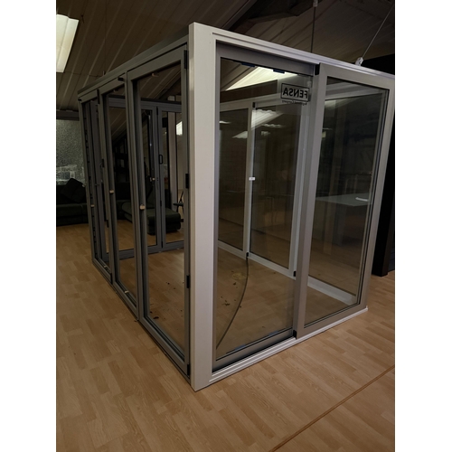 172 - Two sets of bifold door frames together with two sets of sliding doors