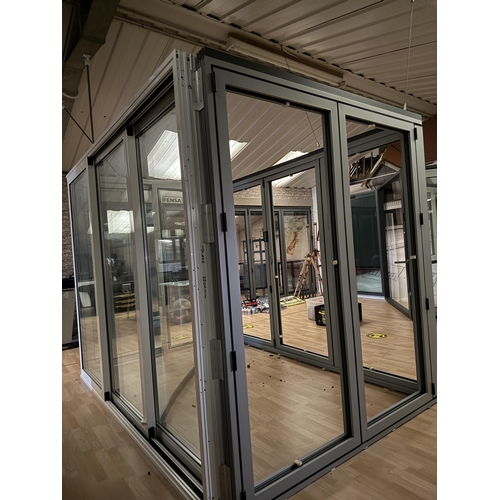 172 - Two sets of bifold door frames together with two sets of sliding doors