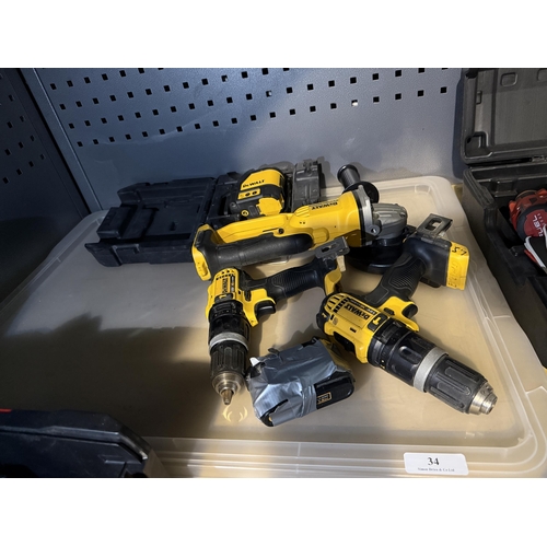 34 - A DeWalt cordless Laser chalkline, a DeWalt cordless angle grinder, two DeWalt cordless drills and a... 