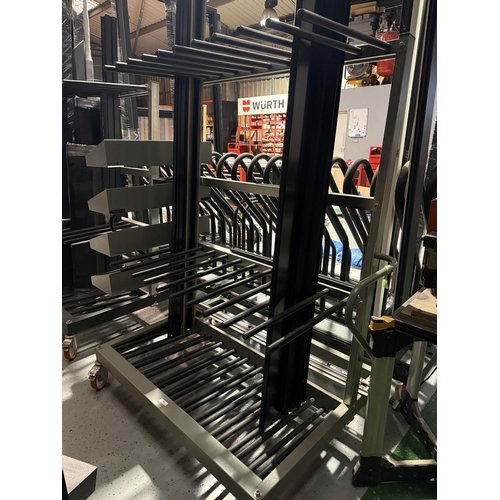 60 - An anodised and black metallic ten section window frame trolley fitted four trays to one side (conte... 