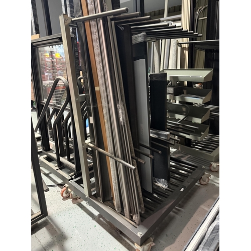 61 - An anodised and black metallic ten section window frame trolley (contents included)