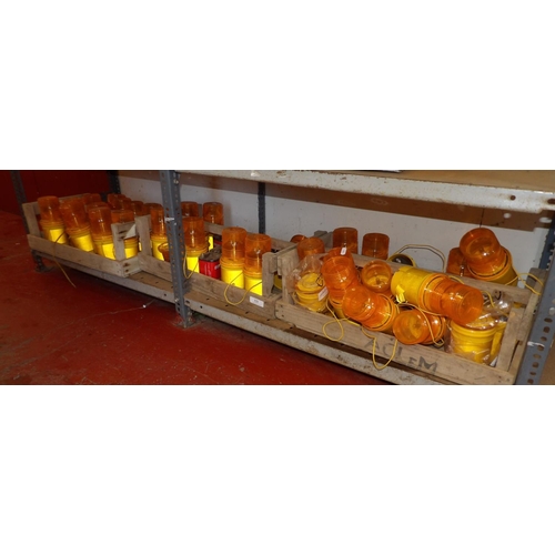 121 - A large quantity of cordless amber warning beacons