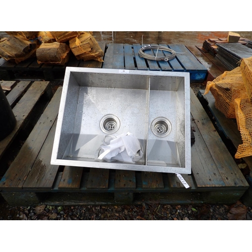 88 - A contemporary stainless steel 1 1/2 bowl sink