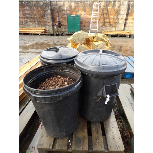 89 - Three PVC dustbins containing a quantity of wood chip