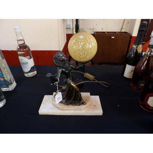 291 - A French Art Deco table lamp modelled in the form of a woman holding a ball