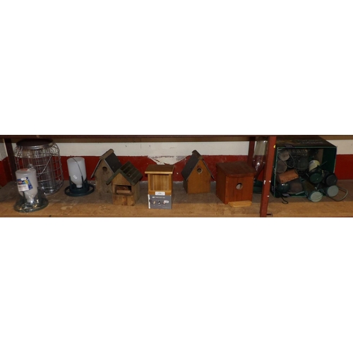 476 - A large and varied assortment of bird feeders, nest boxes, water dispensers etc.