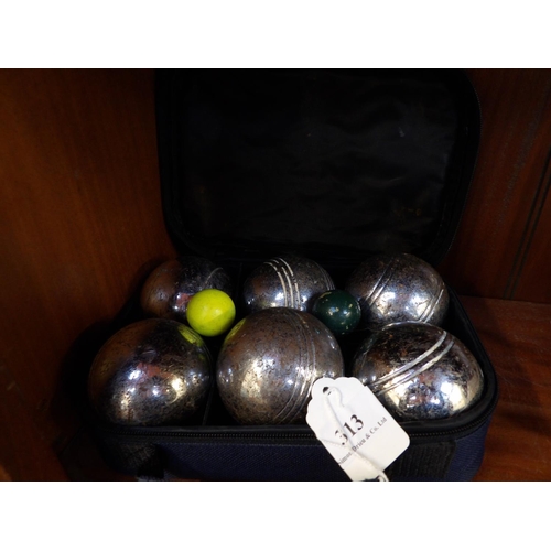 313 - A cased set of six Proteam boules