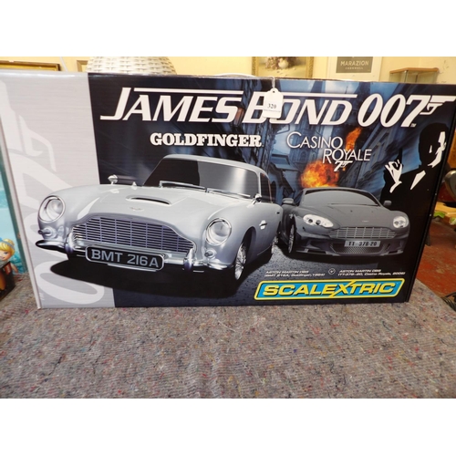 320 - A Scalextric James Bond 007 Goldfinger Casino Royale Aston Martin racing set (new shop stock)