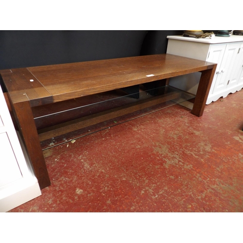 326 - A contemporary solid oak coffee table fitted a glass under tier of rectangular form