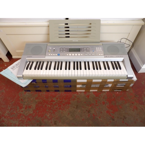 329 - A Casio CTK810 touch response electronic keyboard