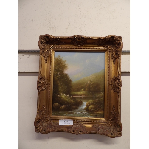 424 - A gilt framed picture of a river bank with sheep in the Victorian style