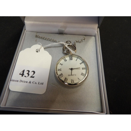 432 - A quartz pendant watch suspended from a chain