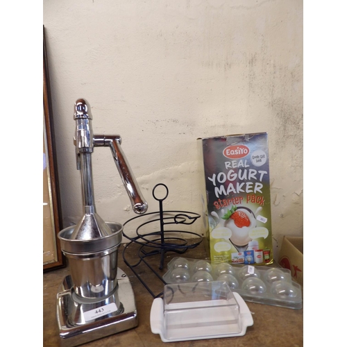 443 - A chromed juicer together with a real yoghurt maker starter pack and other items