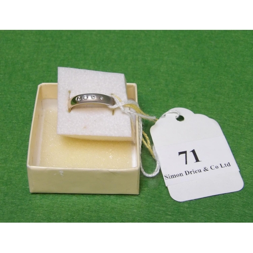 71 - A 9 carat gold ring set with four graduated diamonds and a part brushed finish size M