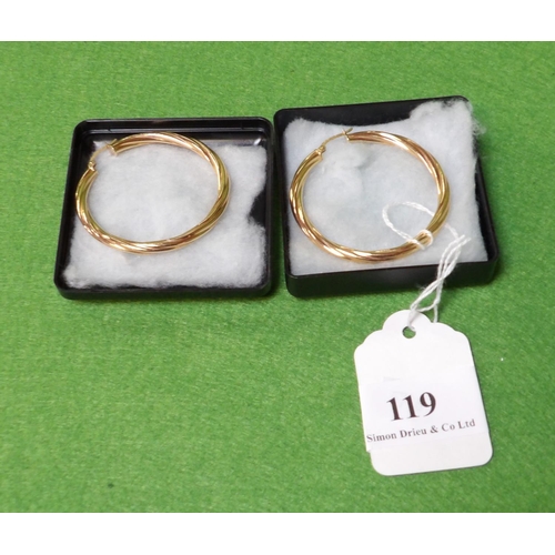 119 - A pair of large 9 carat gold loop earrings