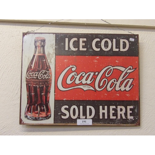 191 - A metallic Coca Cola advertising sign