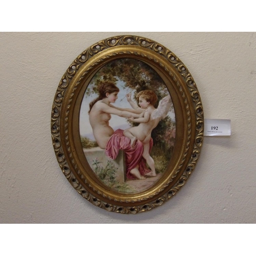 192 - A nineteenth century gilt framed porcelain plaque depicting Venus and a Cupid