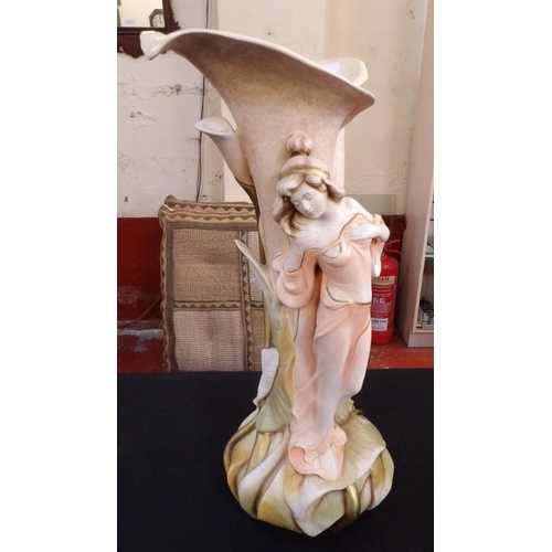 214 - An Art Nouveau style vase of large proportion depicting a girl with Lilies