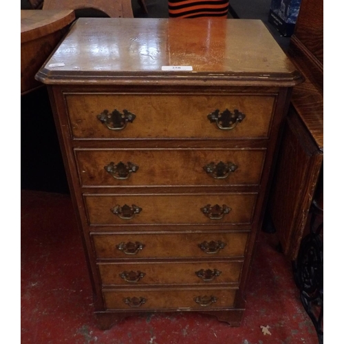 258 - A burr walnut chest of six drawers of diminutive form