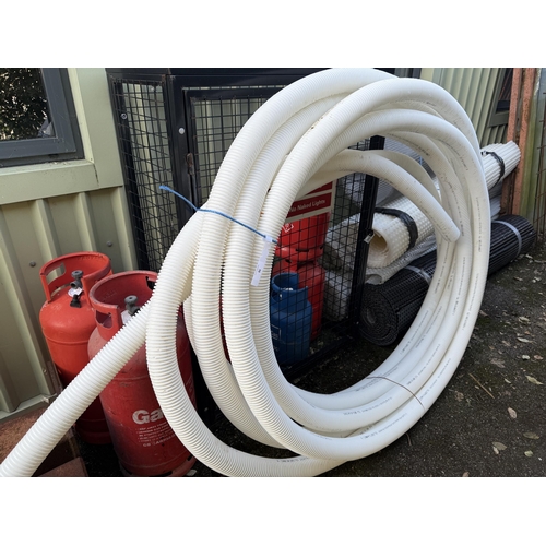 50 - A coil of reinforced flexible pipe