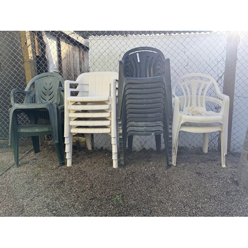 53 - A quantity of stacking PVC garden chairs