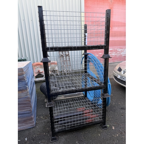 58 - Three steel and galvanised stacking stillages