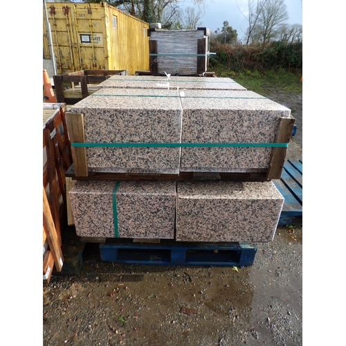 27 - Four pallets of granite slabs, edging and coping