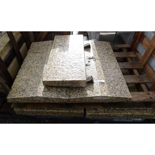 27 - Four pallets of granite slabs, edging and coping