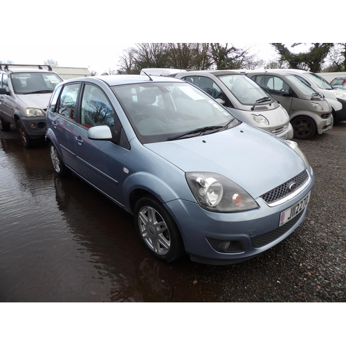 11 - A 2006 Ford Fiesta Ghia 1.4 five door hatchback J112270 (petrol/manual), odometer reading 77,214 mil... 