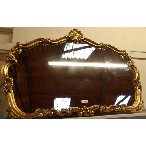 359 - An ornate gilt framed wall mirror