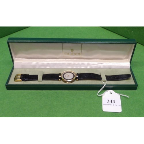 343 - A 1980s Gucci 2000M wrist watch on original Gucci strap