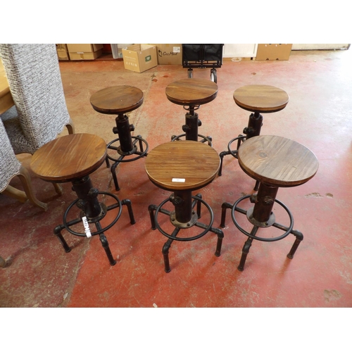 267 - A set of six adjustable stools modelled in the Industrial style