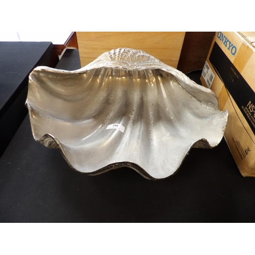 280 - A silvered metallic clam shell of large proportion