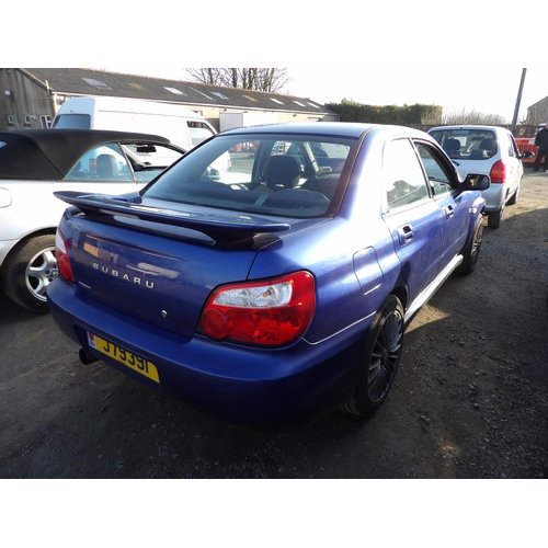 17 - A 2003 Subaru Impreza 2.0 four door saloon J79391 (petrol/manual), odometer reading 77,962 miles