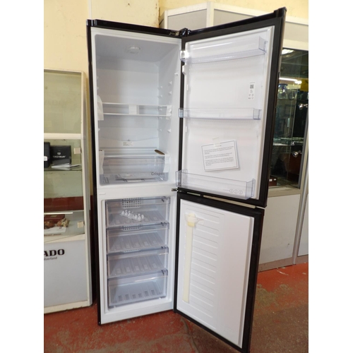 121 - A beko fridge freezer - new shop soiled