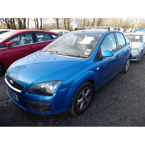 11 - A 2006 Ford Focus Zetec Climate 1.6 five door hatchback J110874 (petrol/manual), odometer reading 34... 