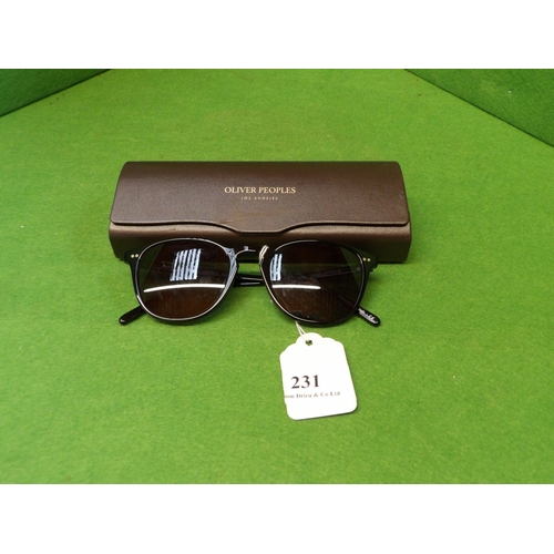 231 - A pair of Oliver Peoples polaroid sunglasses