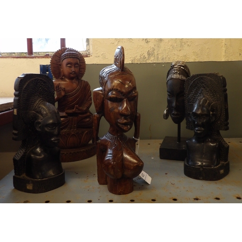 432 - Five ethnic and oriental hard wood carvings