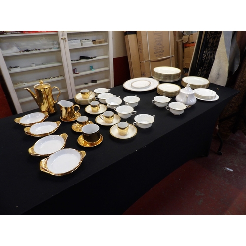 391 - Two ranges of gilded bone china by Royal Doulton and Royal Worcester