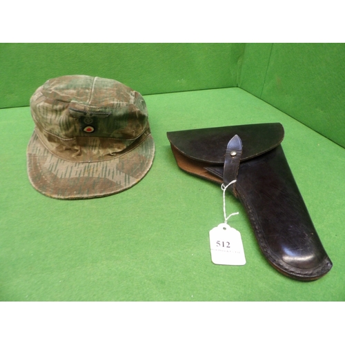 A World War II German splinter pattern M43 field cap together with a ...