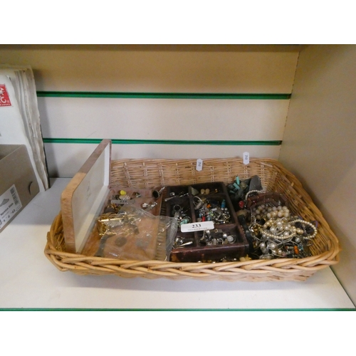 233 - An accumulation of costume jewellery, a wristwatch etc
